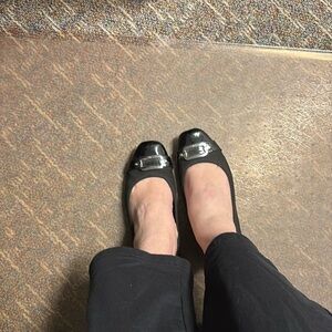 Well worn ballet flats